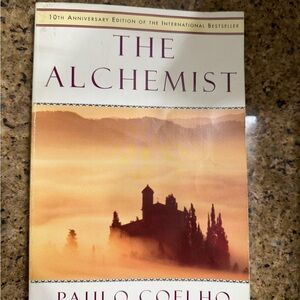 The Alchemist by Paulo Coelho - 10th Anniversary Edition (White & Orange Cover)
